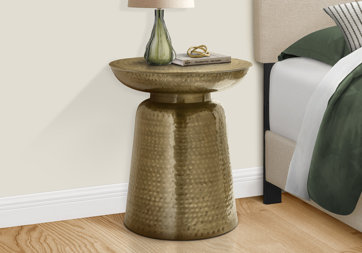 Antique brass hammered accent table with decorative top perfect for a side table
