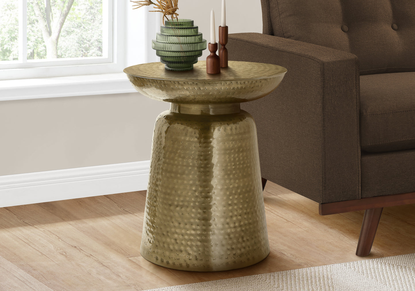 Hammered brass accent table with a wide shallow bowl top and tapered base