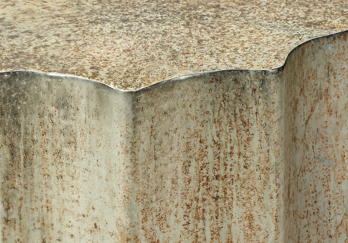 Abstract textured surface with distressed beige and rust tones evoking industrial charm