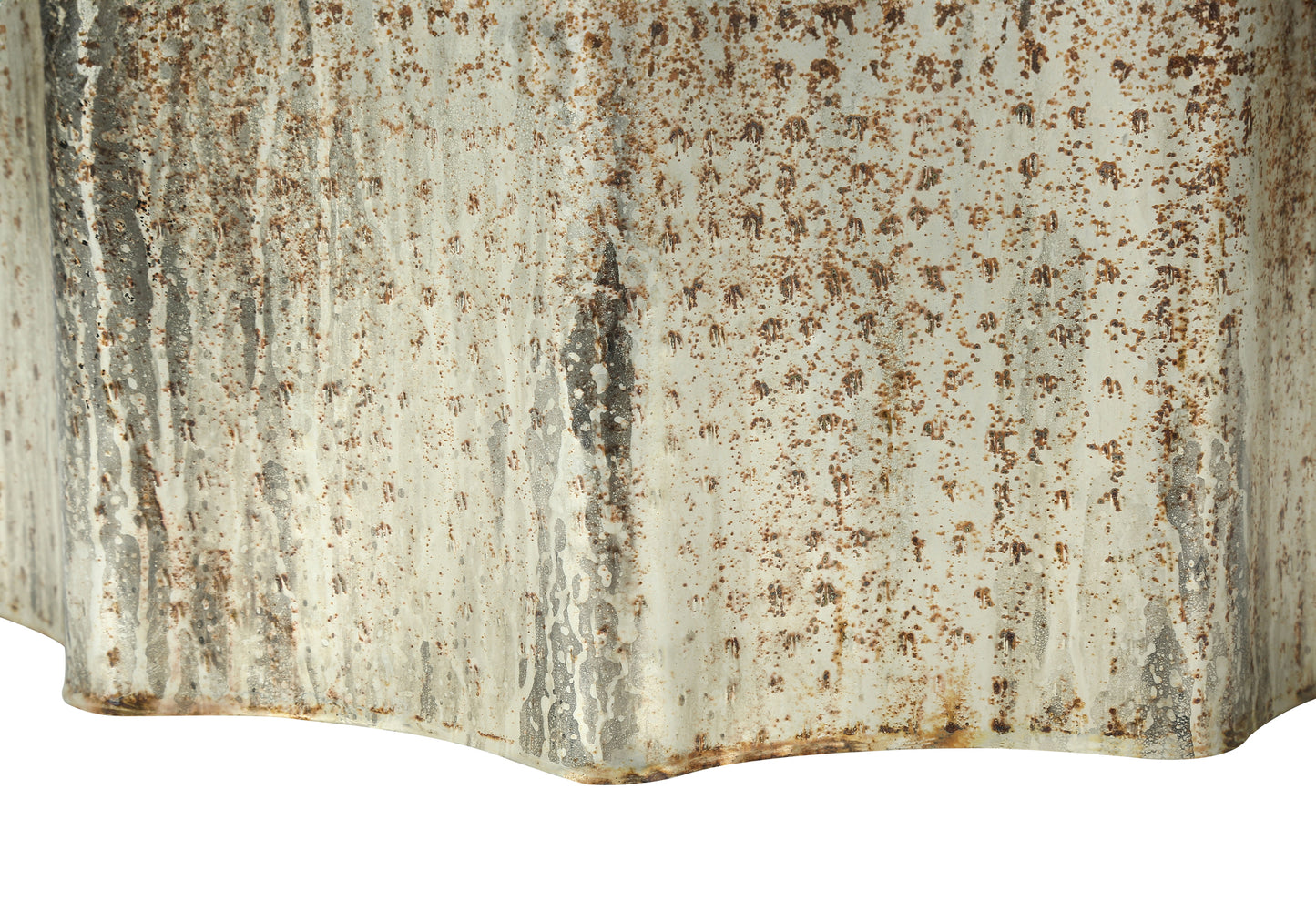 Distressed galvanized metal bucket with textured rust patterns