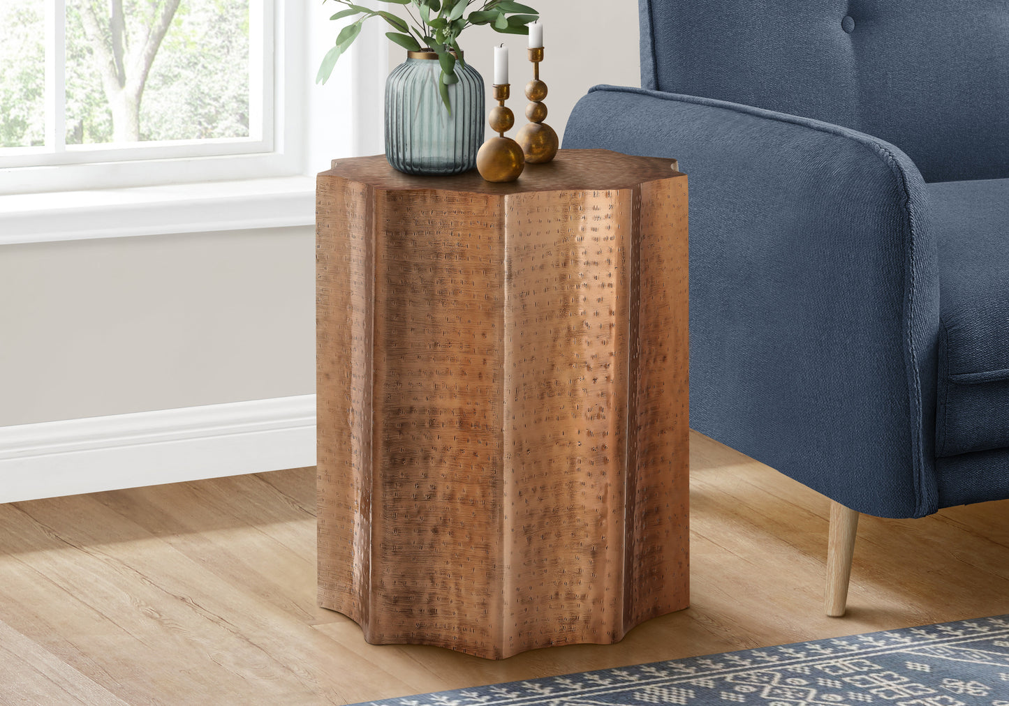 Textured copper octagonal side table with metallic finish adds elegance to living room decor