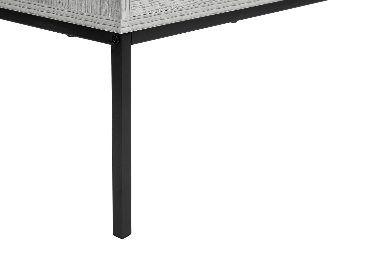 Closeup of a modern gray woodgrain top table with sturdy black metal legs