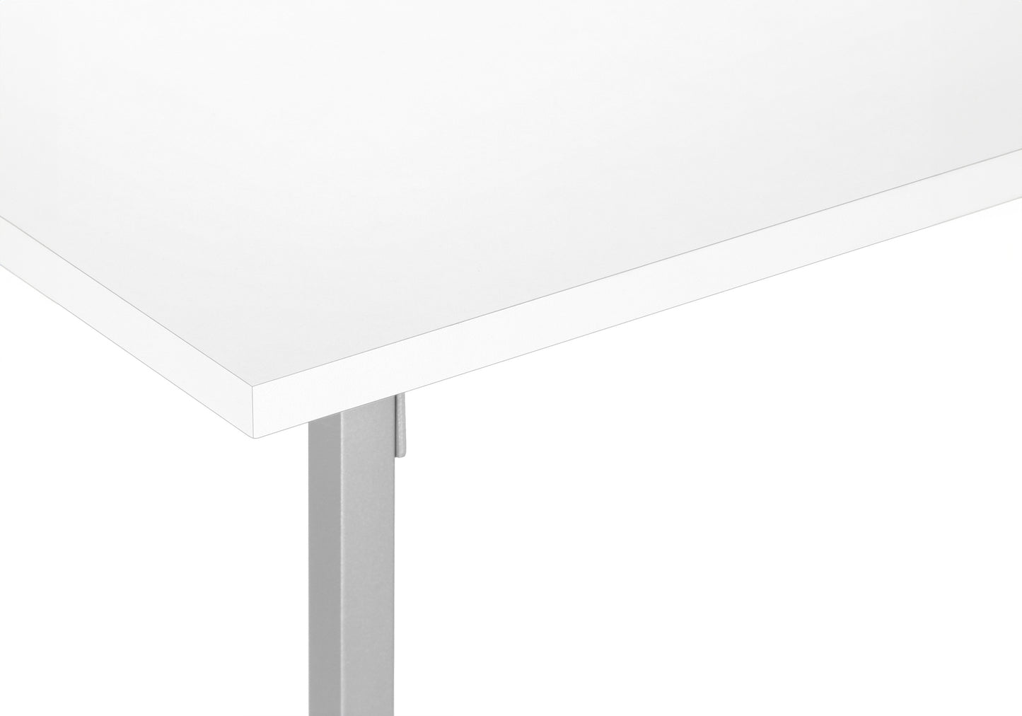 Clean white desk surface with a modern silver metal leg in a closeup shot