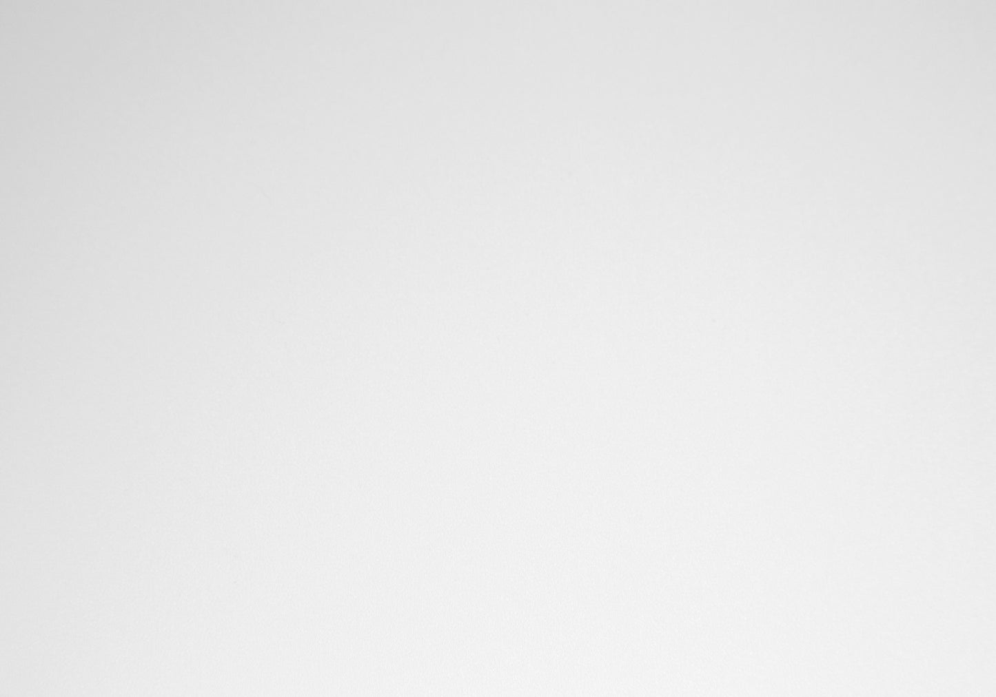 Minimalist white ceramic coffee mug with a comfortable handle for daily use