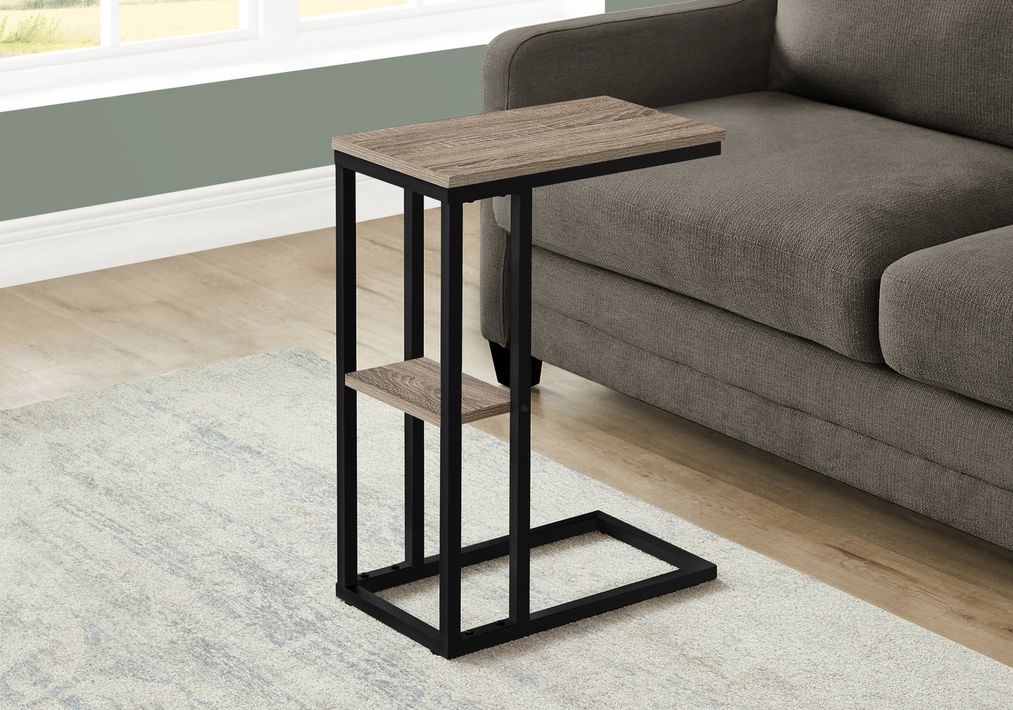 Cshaped side table with weathered oak finish and black metal frame perfect for sofa use