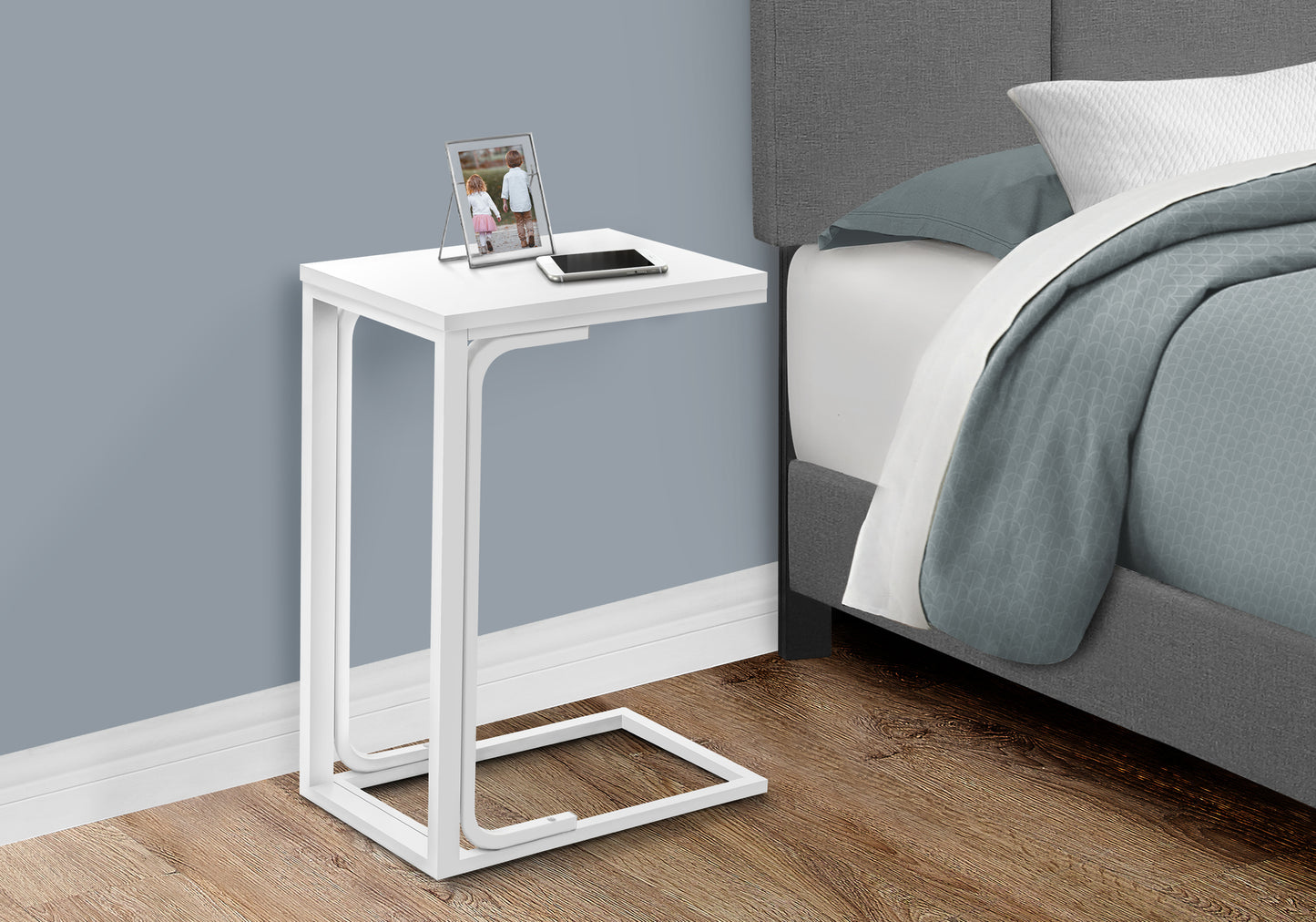 Modern white Cshaped end table with metal frame ideal for small spaces