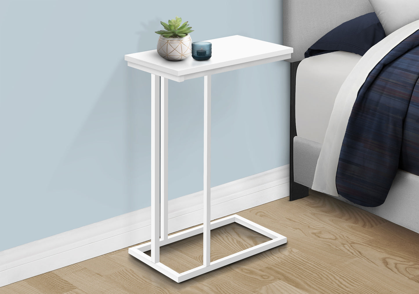 White metal Ctable with rectangular top ideal for bedside use