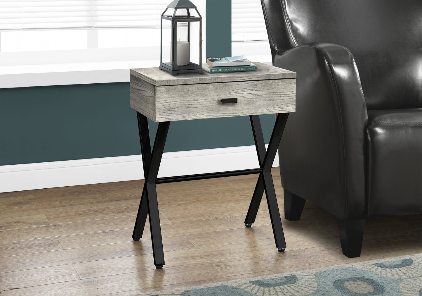 Modern gray wood grain end table with black metal Xframe legs and single drawer