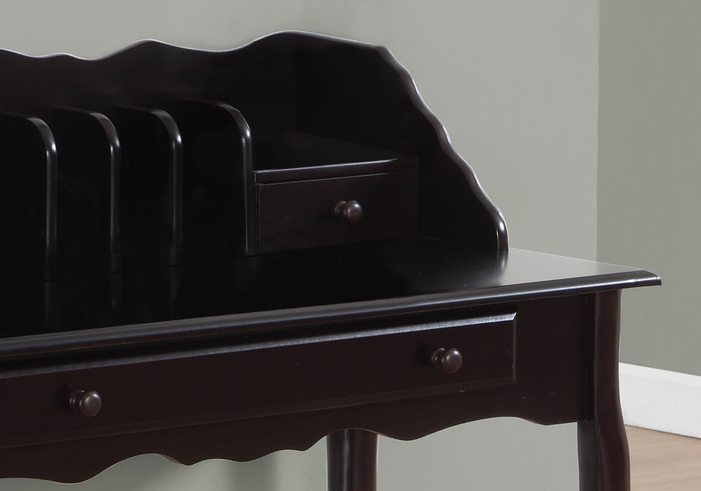 Dark brown secretary desk with builtin organizer slots and a small drawer