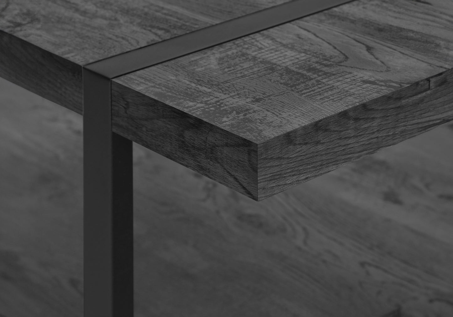 Dark gray wood table with black metal accent strip and leg detail
