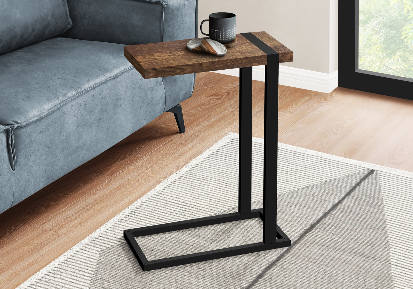 Industrial wood and black metal Ctable perfect for placing drinks next to a couch