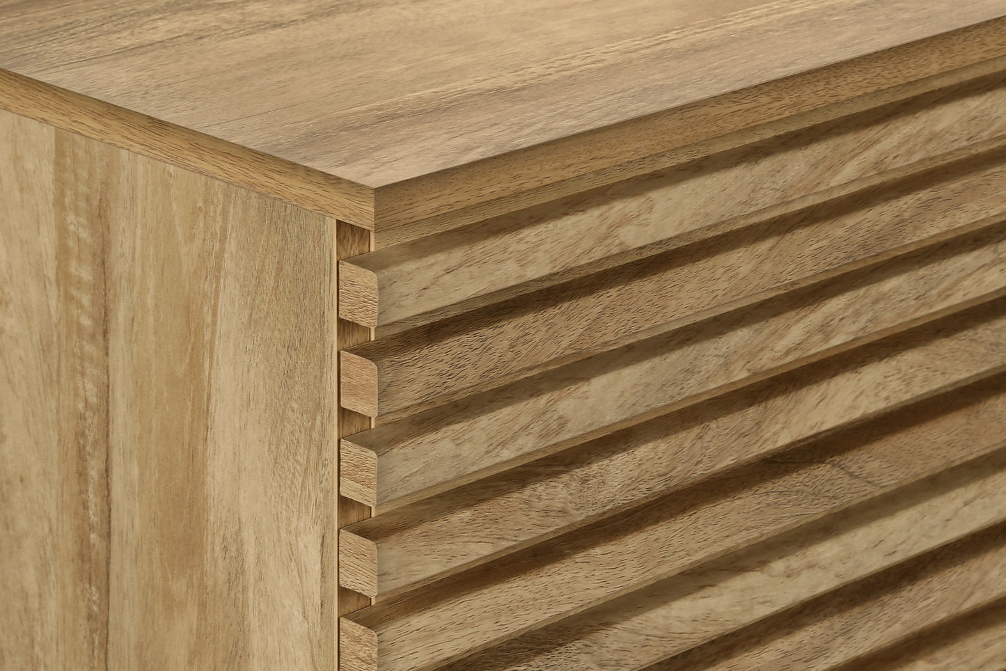 Light brown wood cabinet with slatted drawer fronts modern design