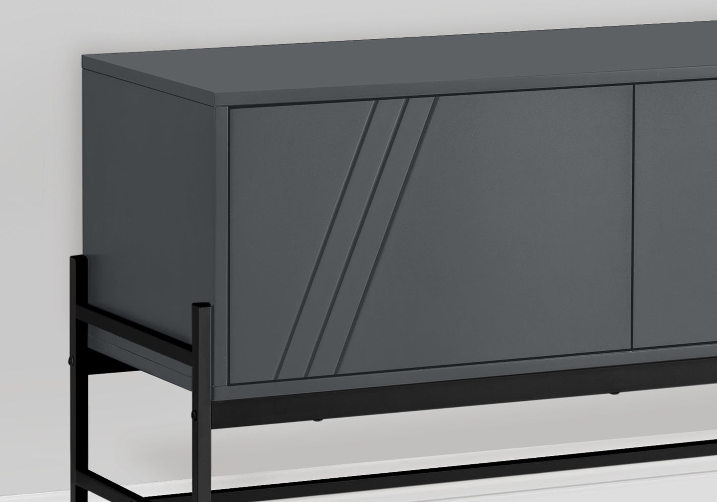 Modern dark gray sideboard with subtle etched diagonal lines on one door on black metal legs