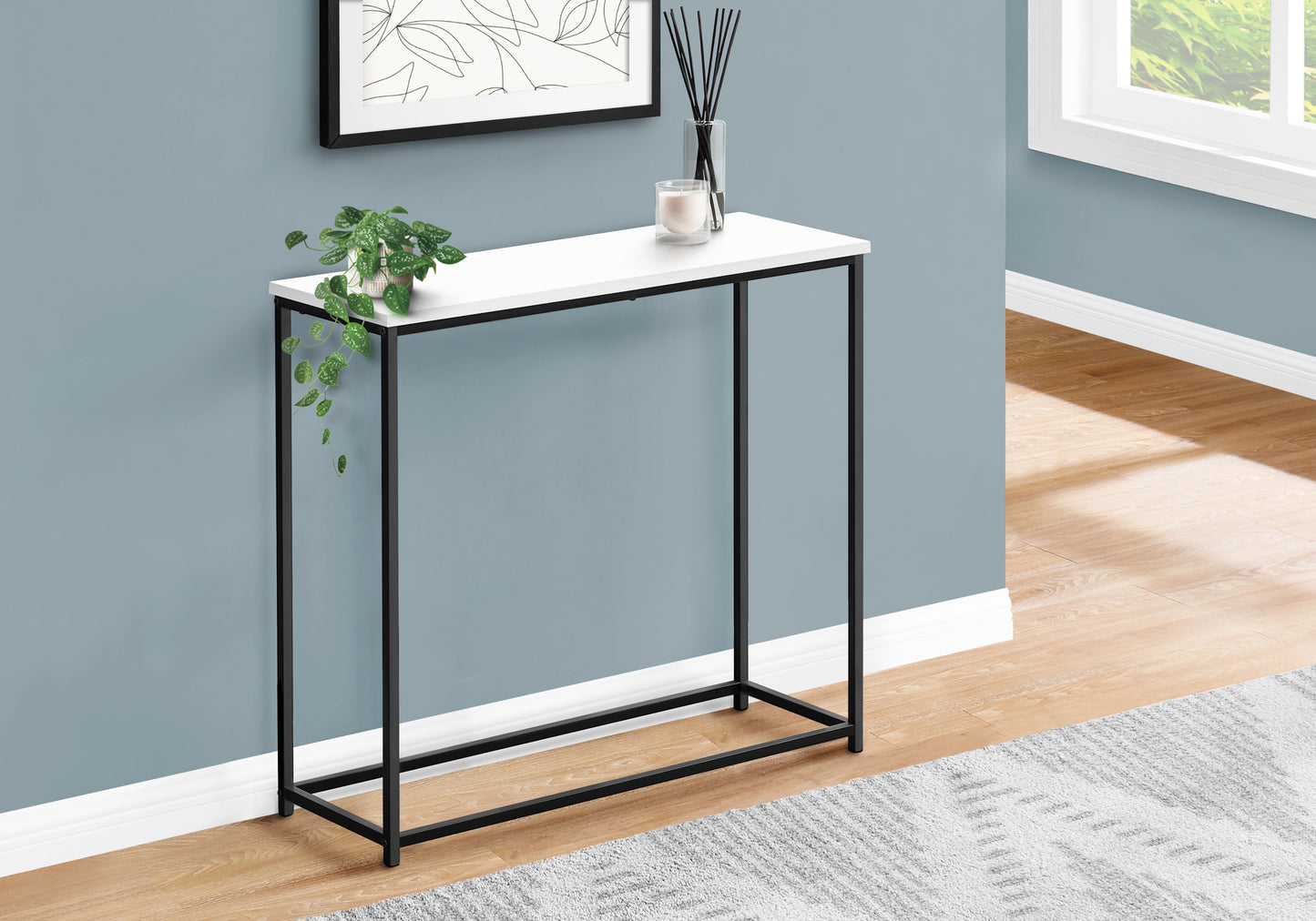 Sleek white top console table with black metal frame perfect for entryways