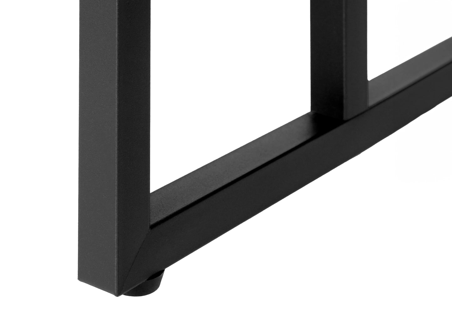 Closeup of a black metal table leg with protective foot