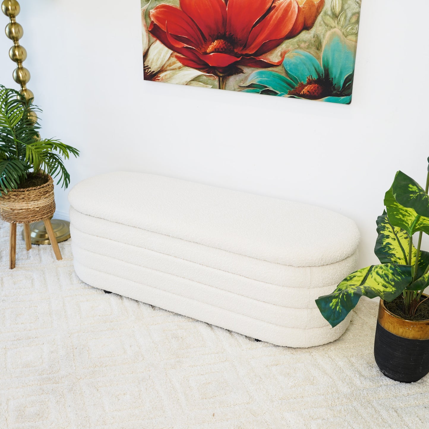 Textured cream storage ottoman with ribbed detailing perfect for entryway seating