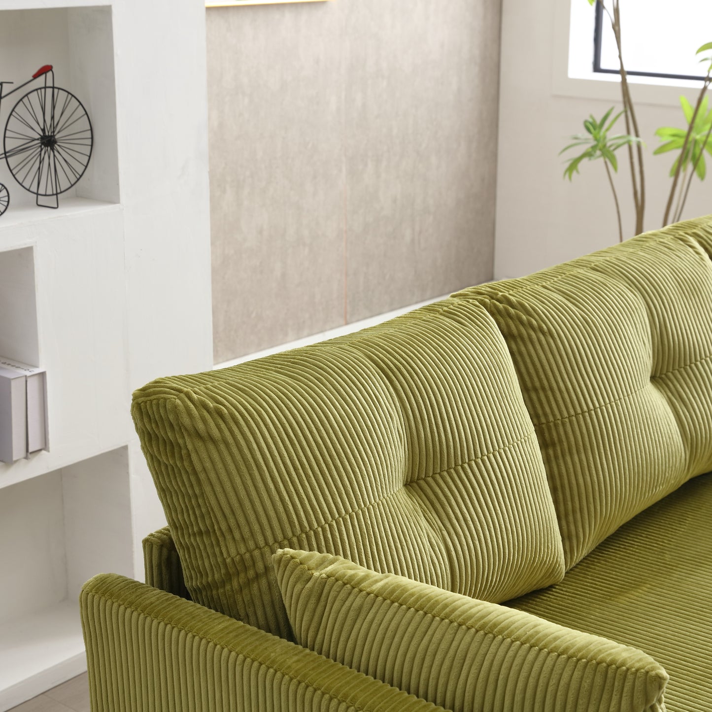 Plush lime green corduroy sofa with tufted cushions ideal for a cozy living room