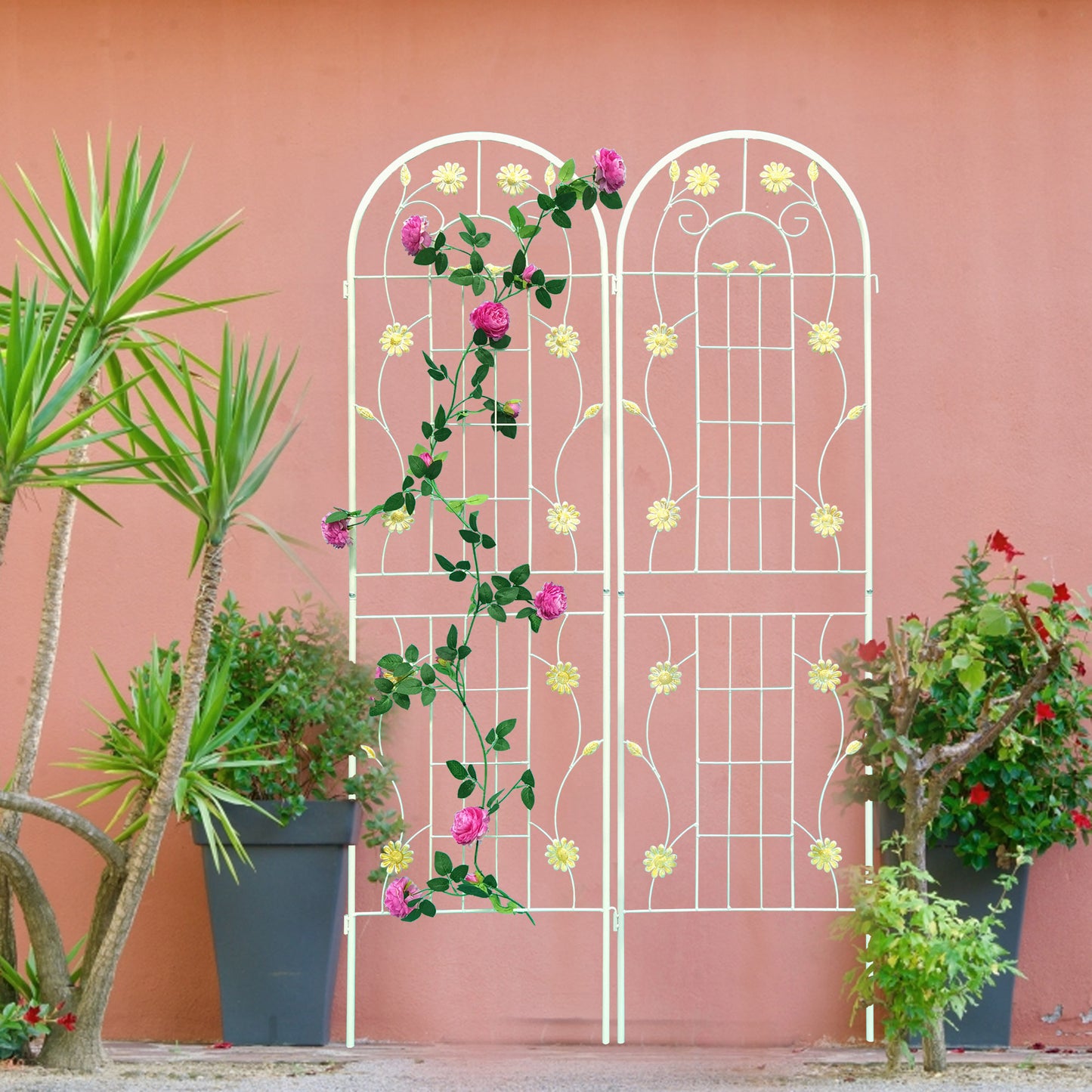 White metal garden trellis with arched top adorned with floral accents for climbing roses