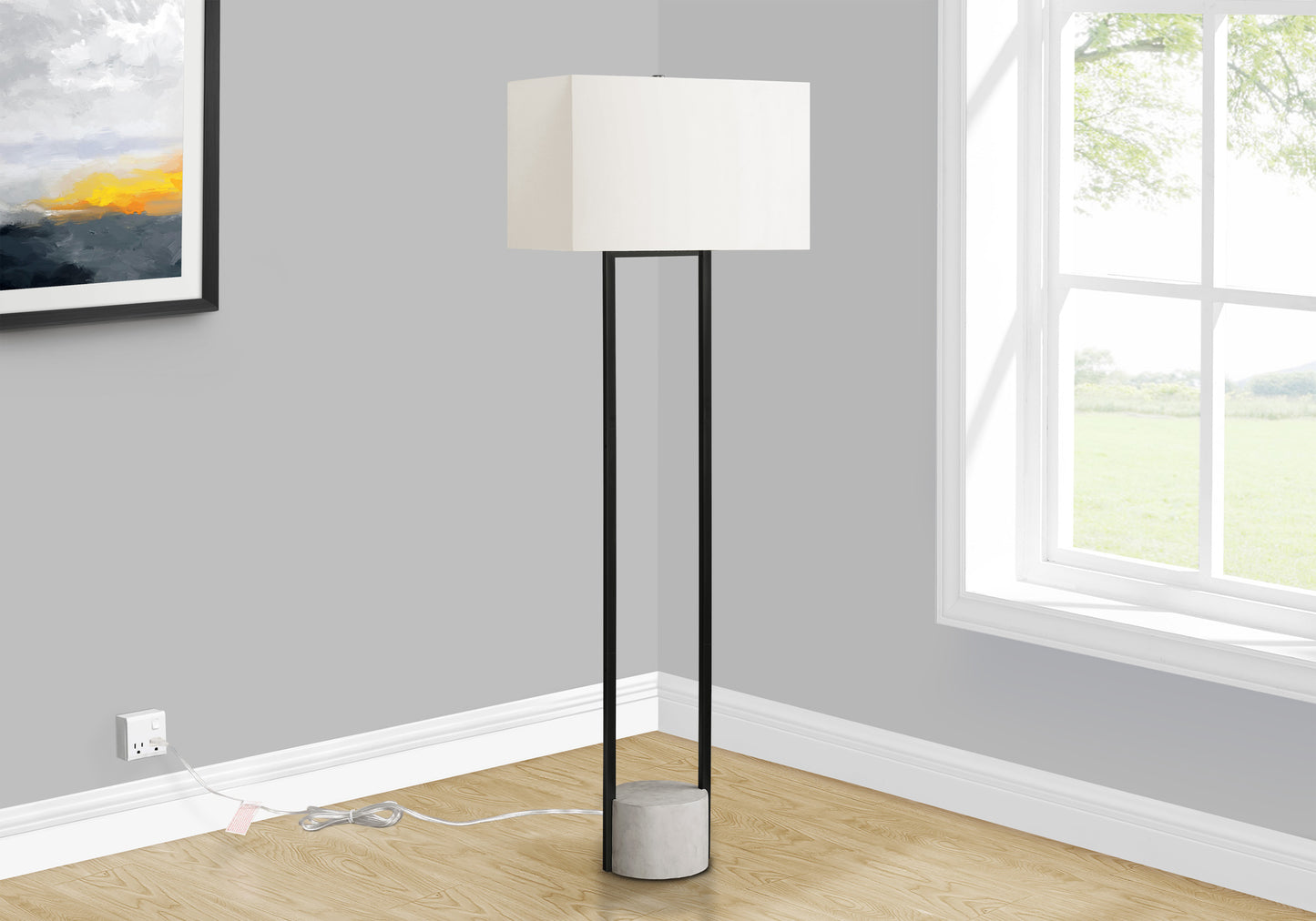 Modern black floor lamp with concrete base and white rectangular shade