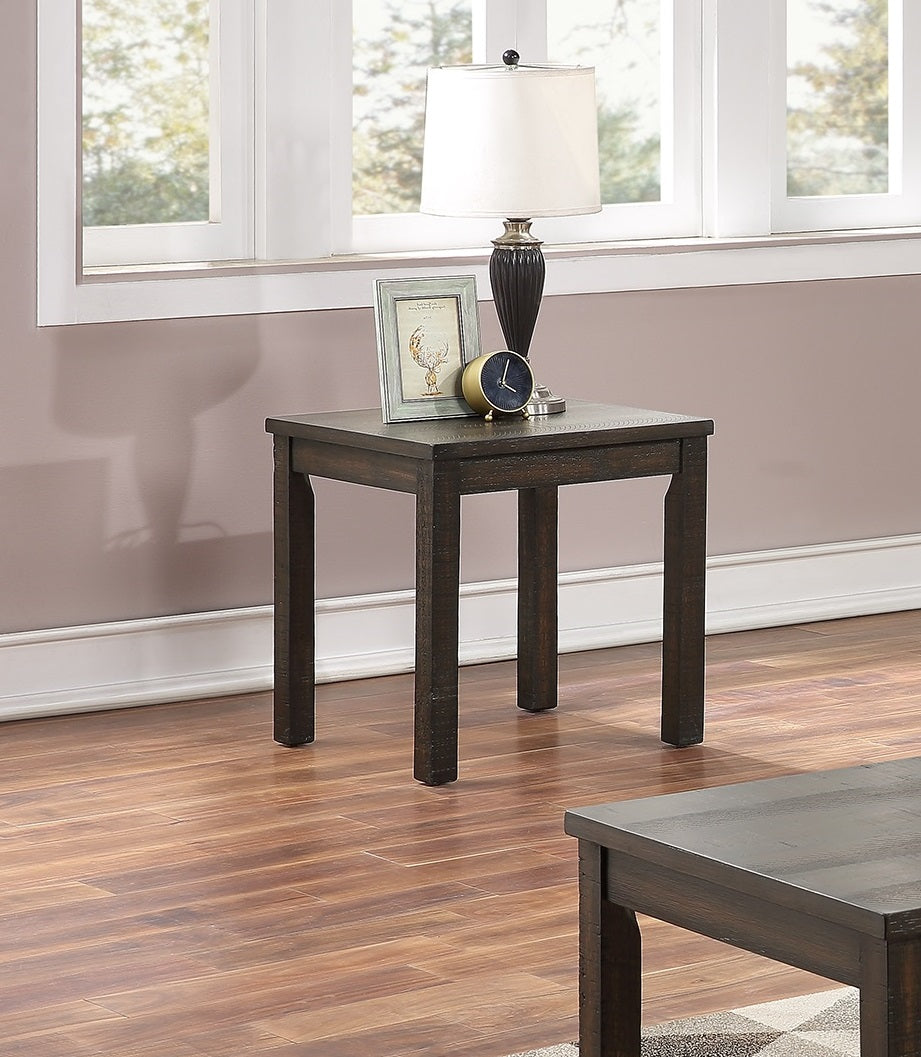 Dark wood square end table with framed art and lamp