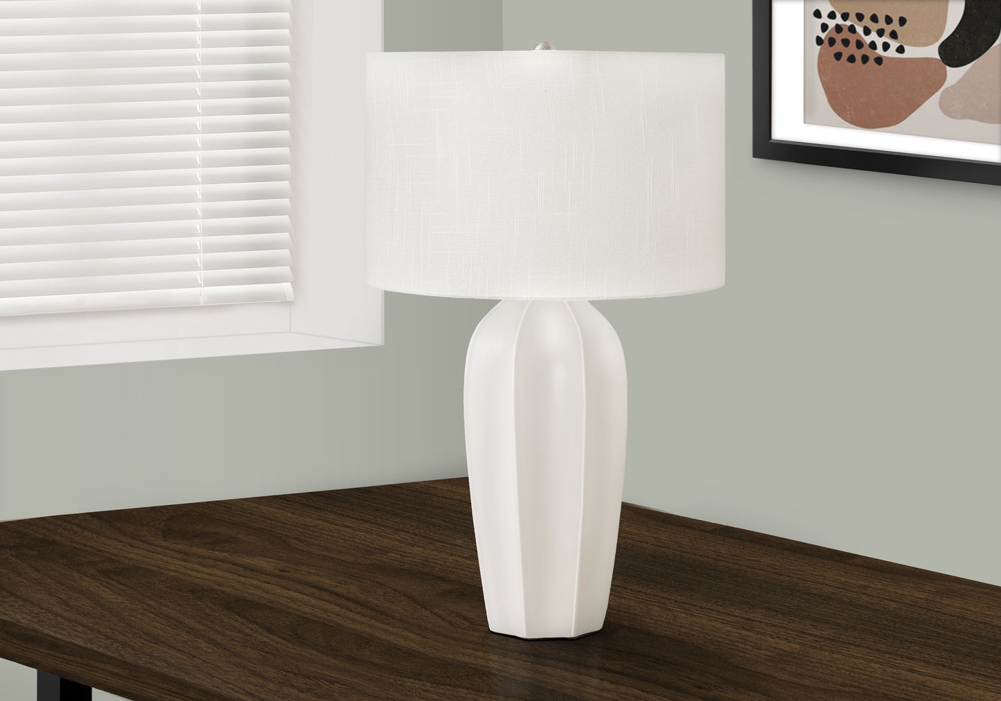 Modern white ceramic table lamp with a textured linen shade perfect for bedside tables