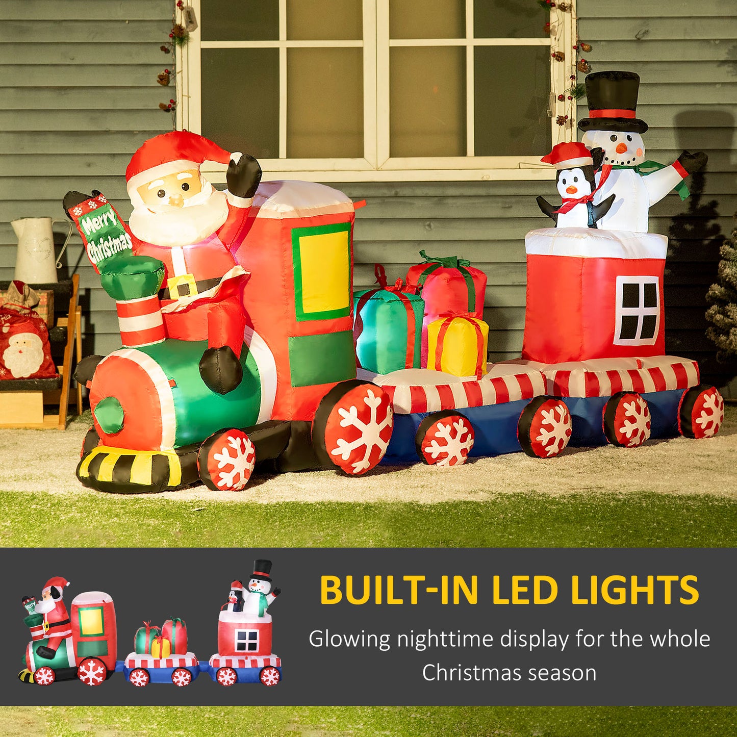 Inflatable Santa Claus Christmas train with a snowman and penguin on top