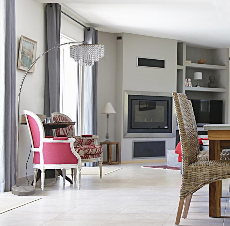 Elegant arc floor lamp with crystal chandelier shade and marble base