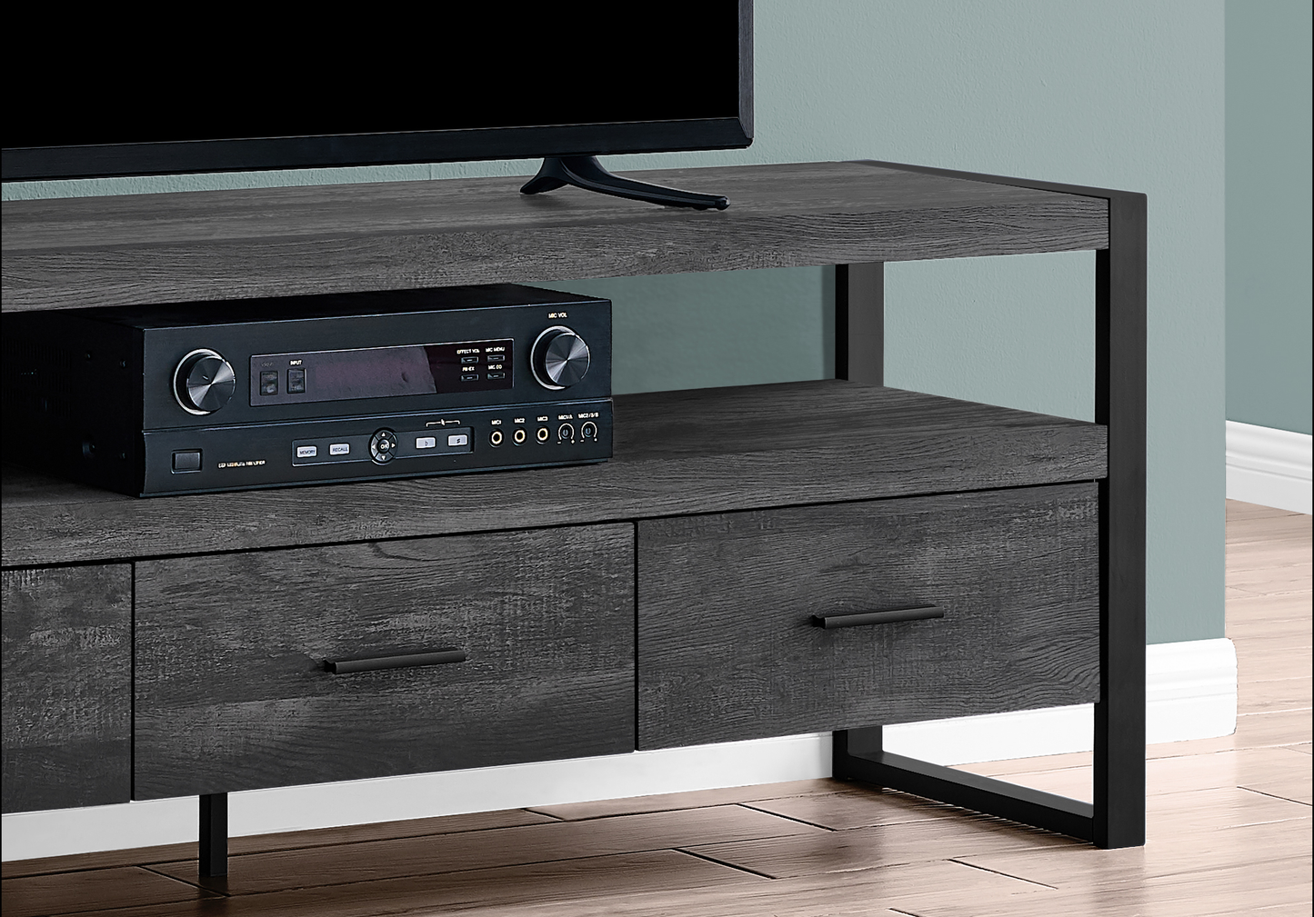 Dark wood entertainment center with black metal frame and two drawers