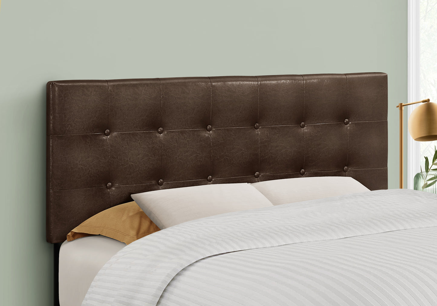 Tufted faux leather headboard in dark brown with button accents