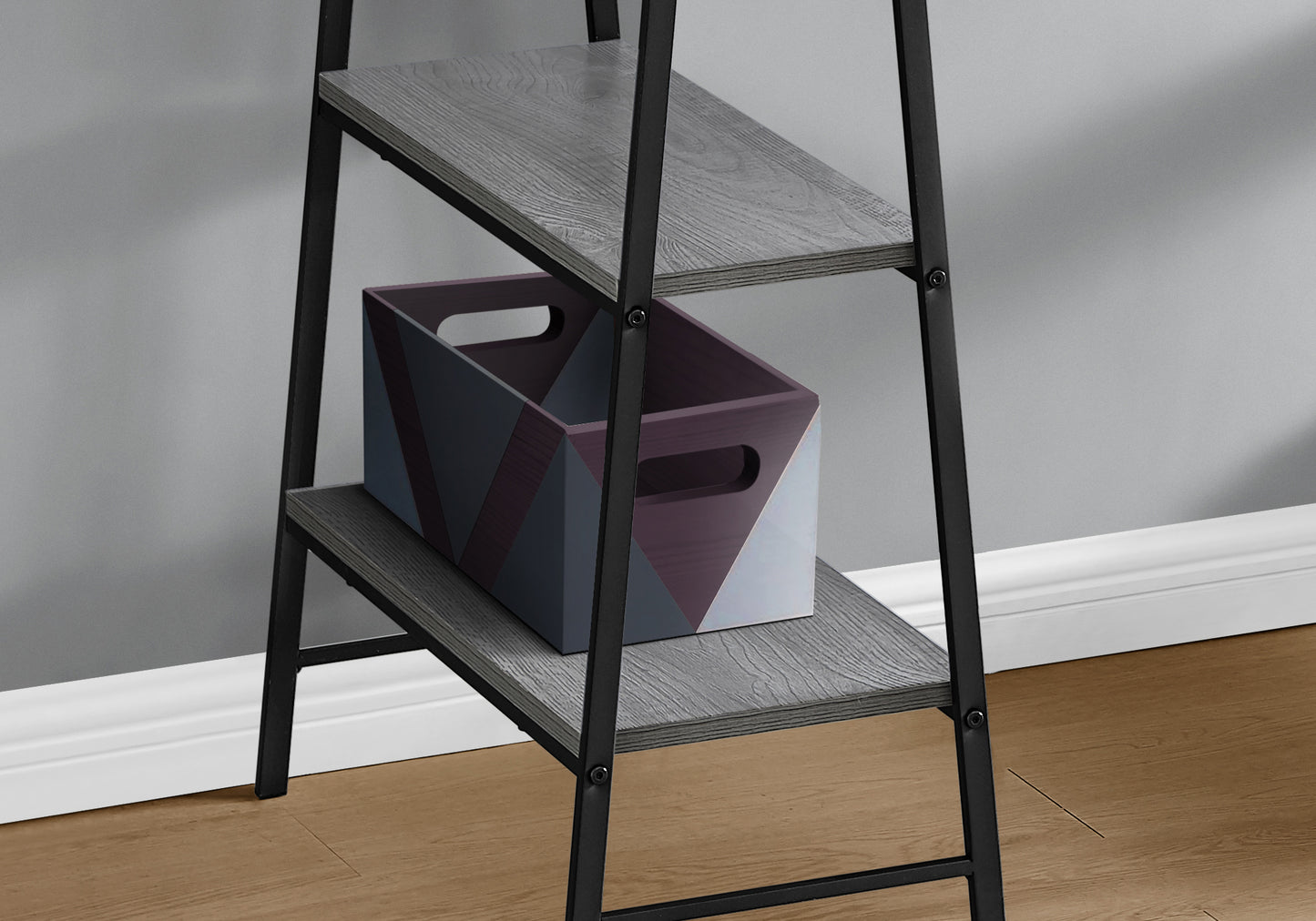 Modern gray woodgrain bookshelf with black metal frame and geometric storage bin