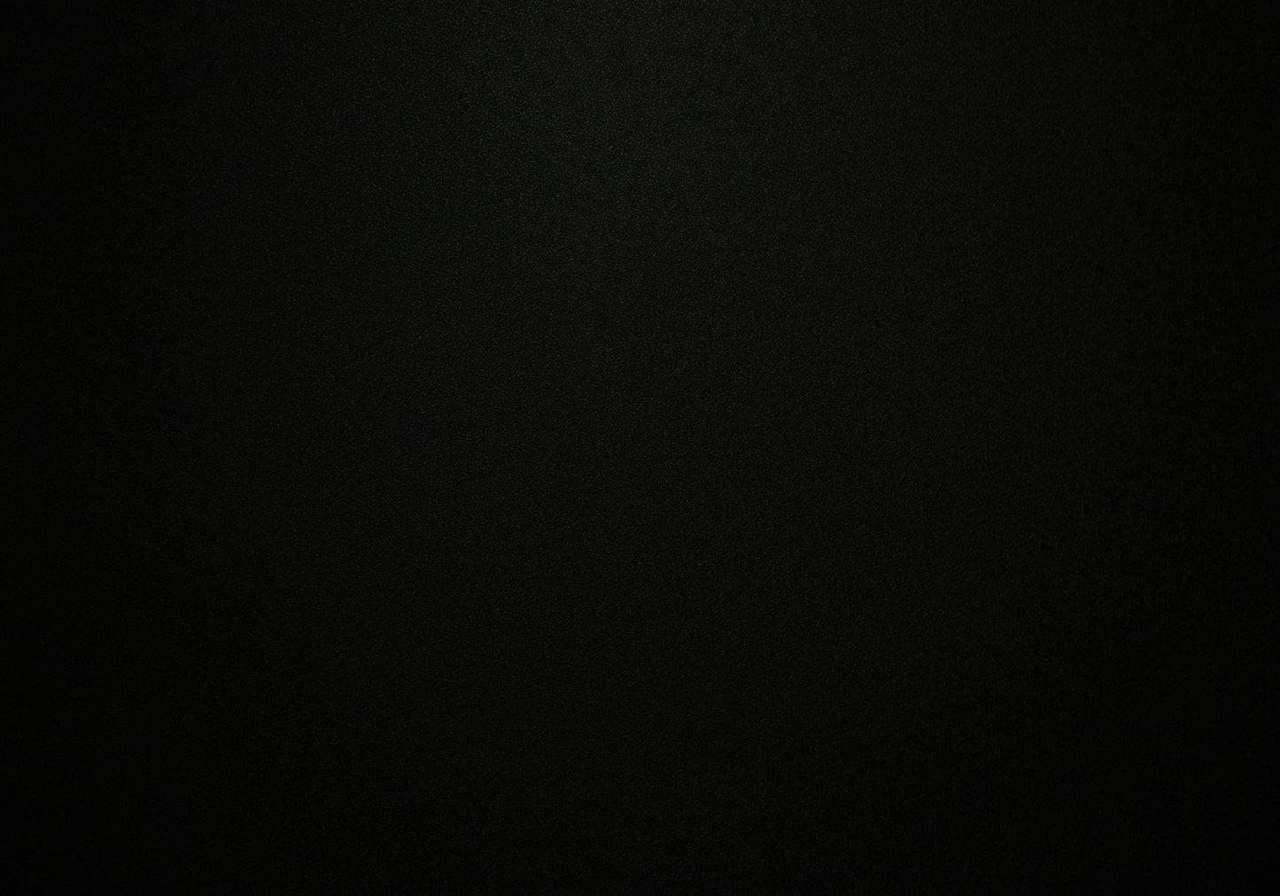 Abstract black textured background suitable for product backdrops