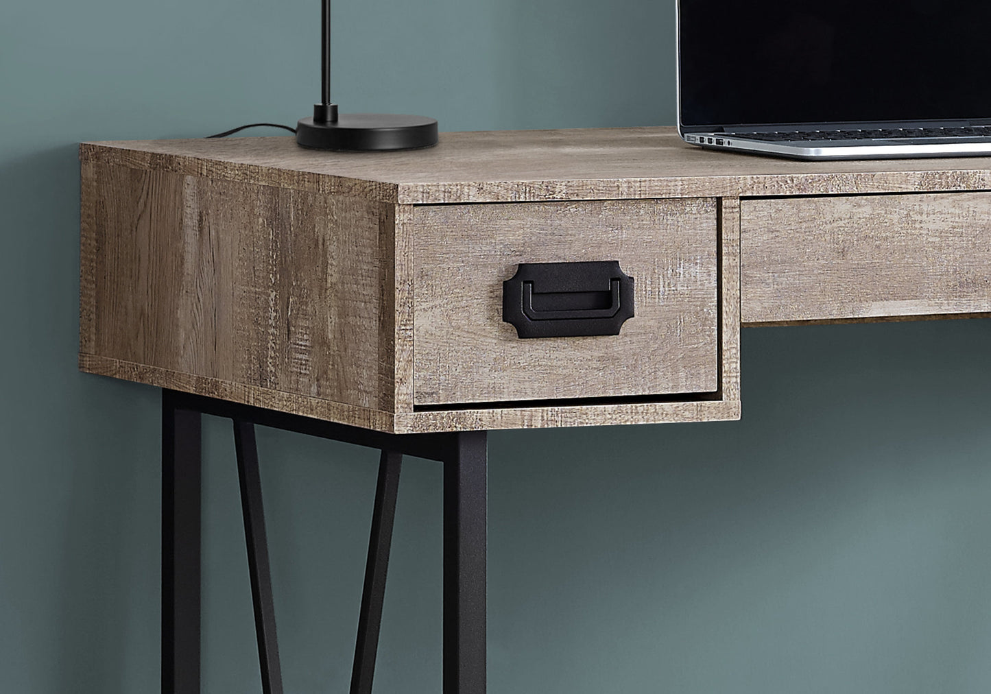Rustic wood desk with black metal legs featuring a single drawer with industrial pull