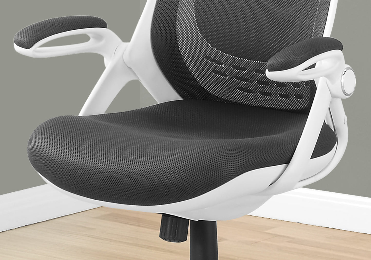 Ergonomic office chair with breathable mesh back and padded seat in charcoal grey