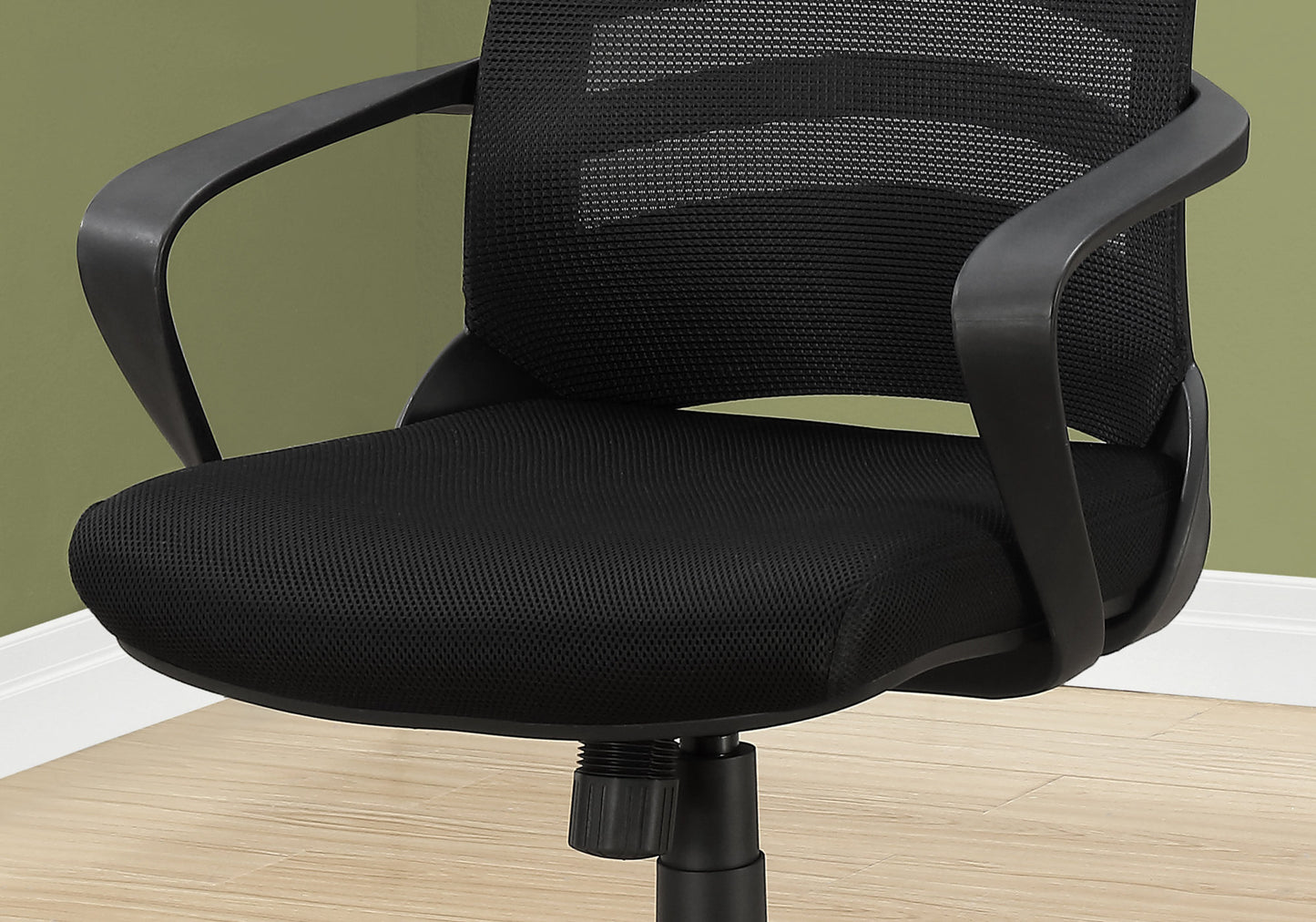 Black mesh office chair with padded seat and curved armrests for comfort