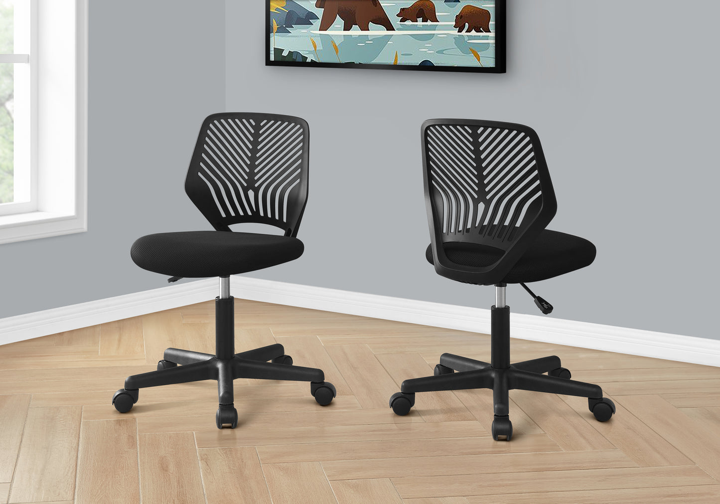 Black mesh ergonomic office chair with a sleek design ideal for home workspaces