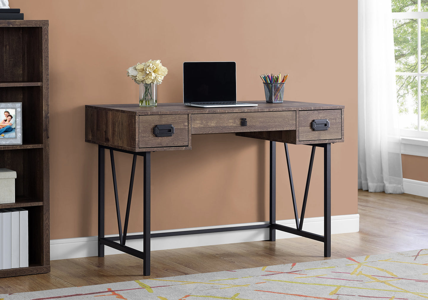 Rustic wood writing desk with black metal legs and three drawers