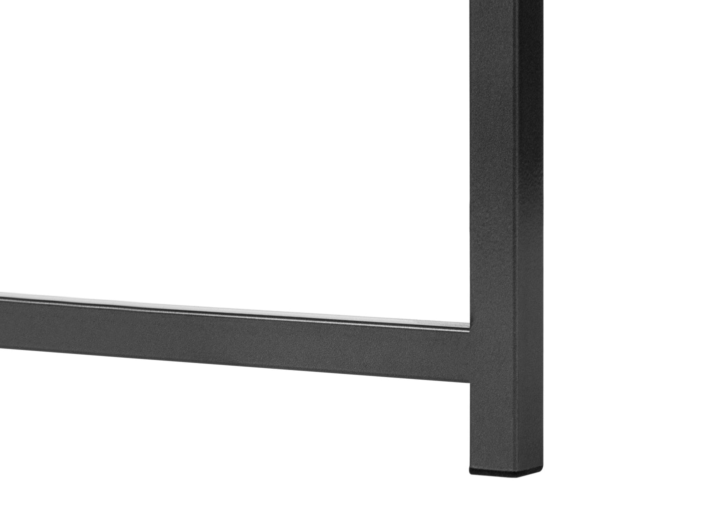 Closeup of a black metal table leg showing brushed texture and clean lines