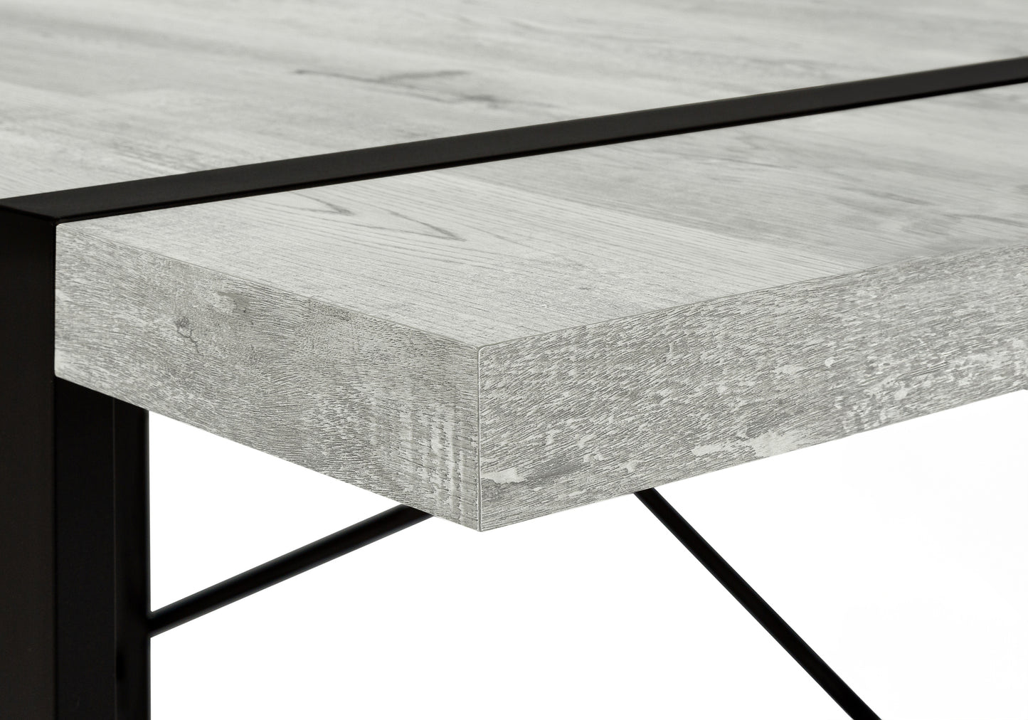 Rustic grey wood grain desk surface with black metal frame accent