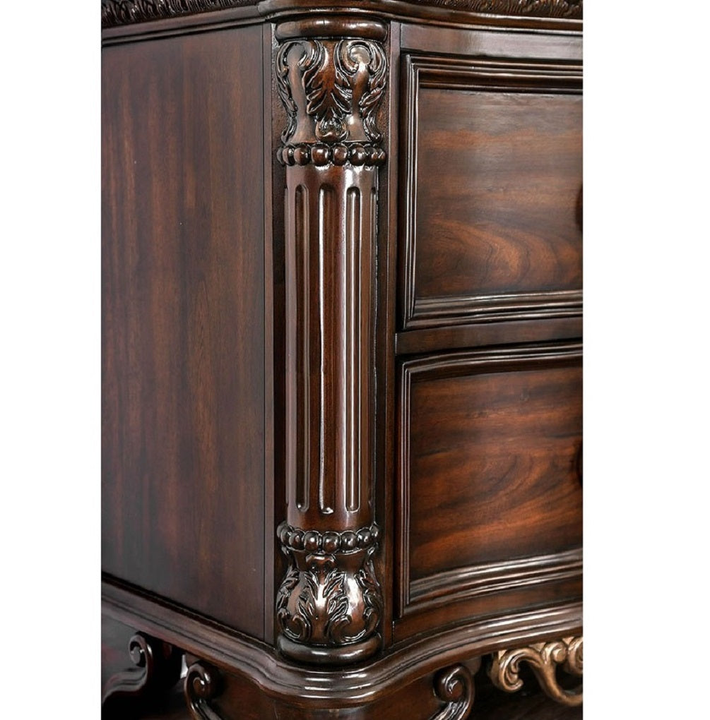 Dark cherry wood dresser detail with ornate fluted column and acanthus leaf carvings