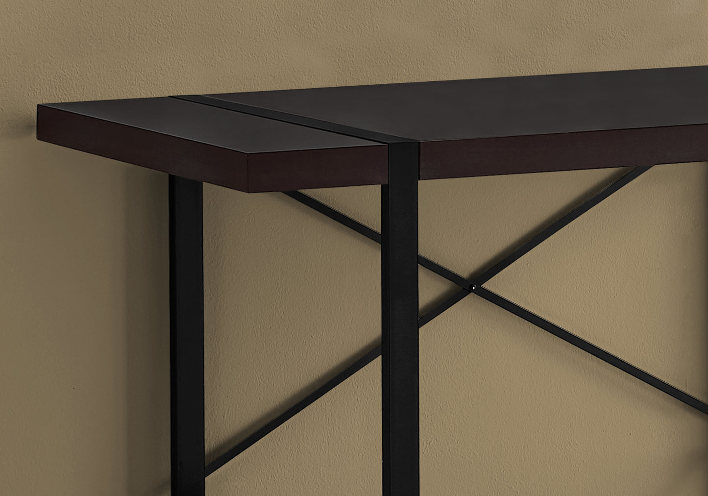 Dark brown entryway console with black metal legs and Xframe detailing