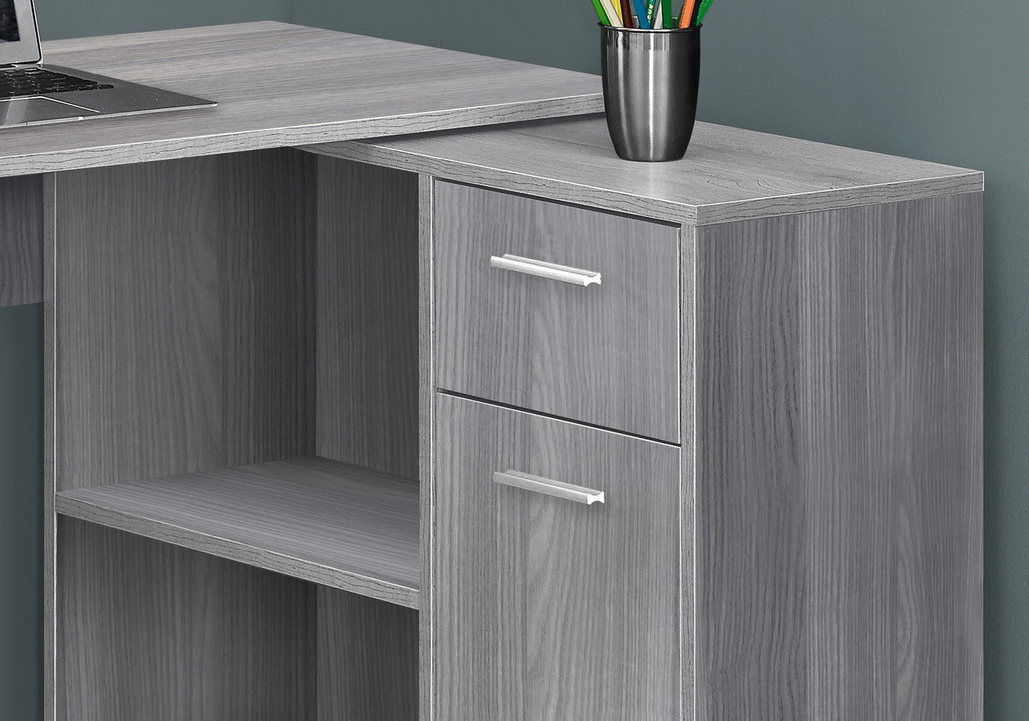Gray wood grain desk with two drawers and open shelving unit