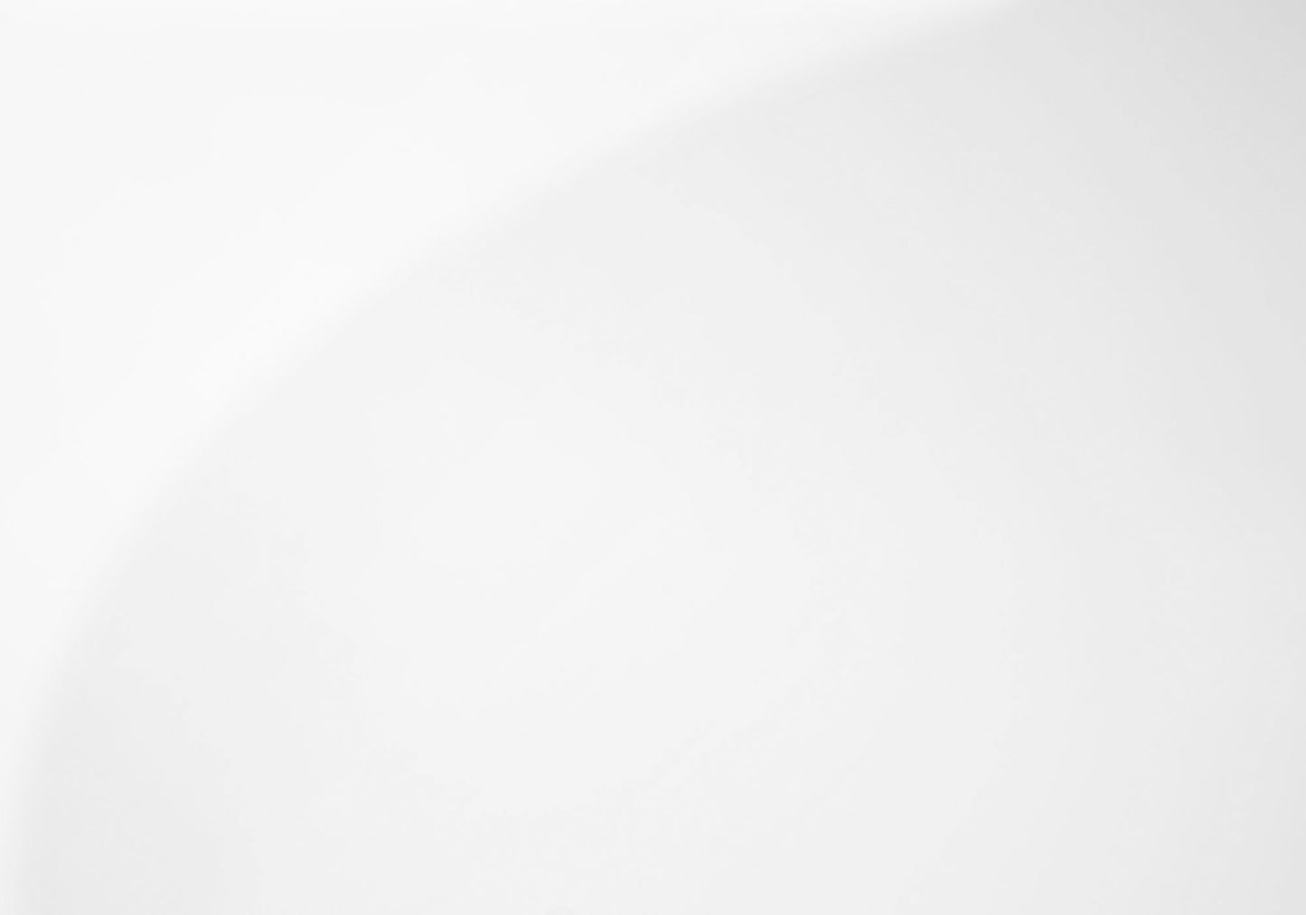 Modern white ceramic coffee mug with ergonomic handle for comfortable grip