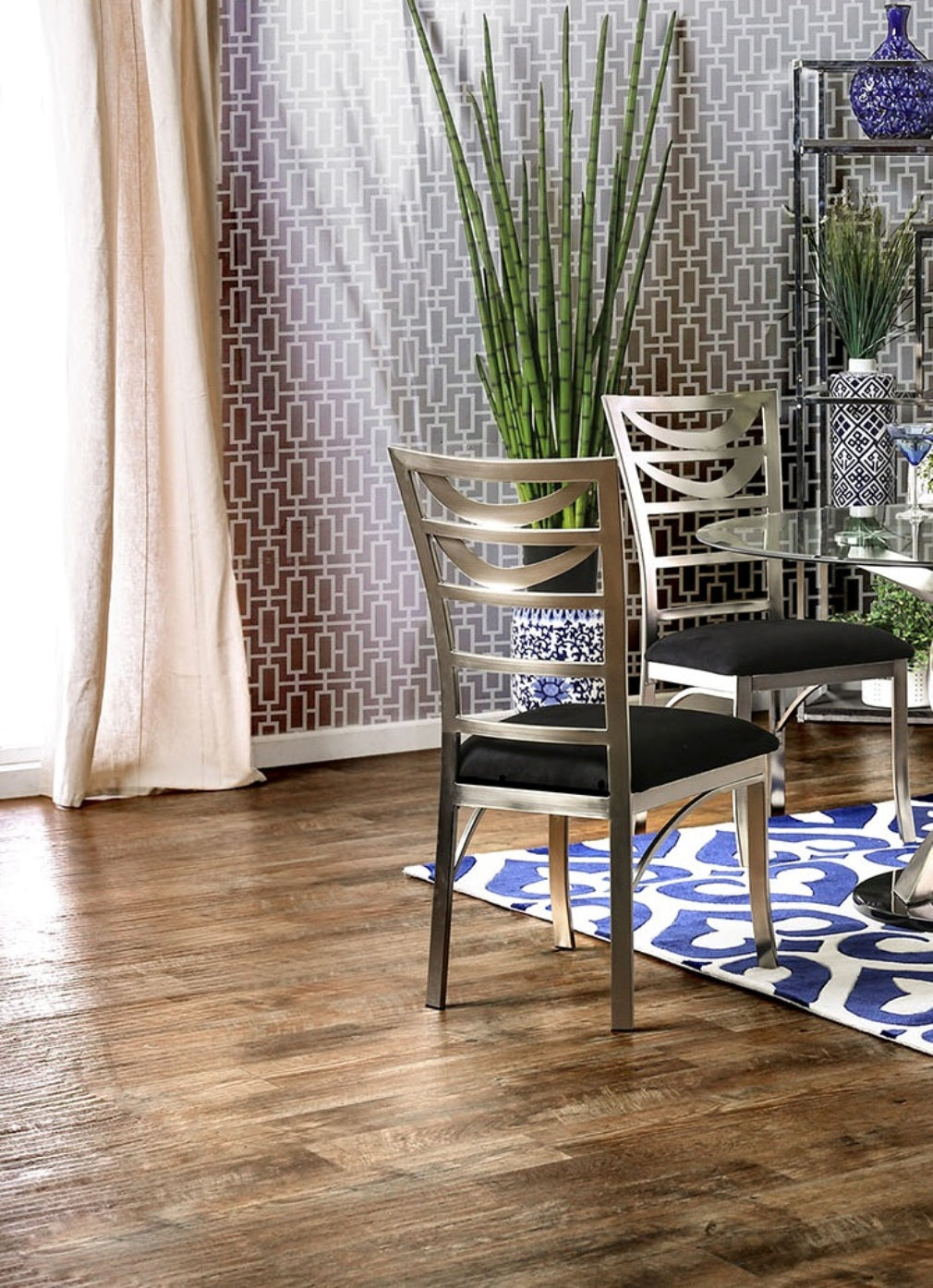 Silver metal dining chair with black upholstered seat modern design