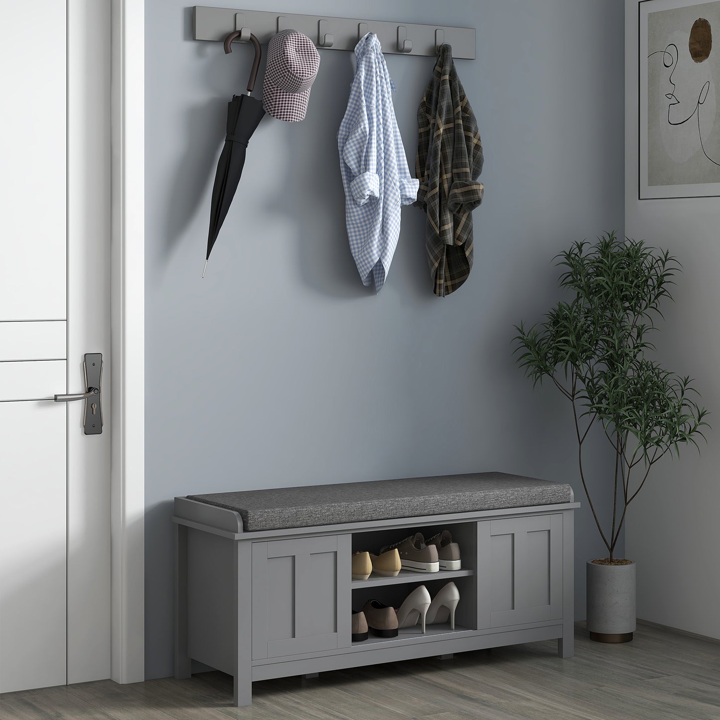 Grey upholstered entryway bench with shoe storage