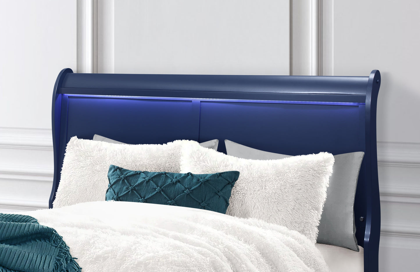 Sleek navy blue sleigh bed frame with integrated blue LED lighting