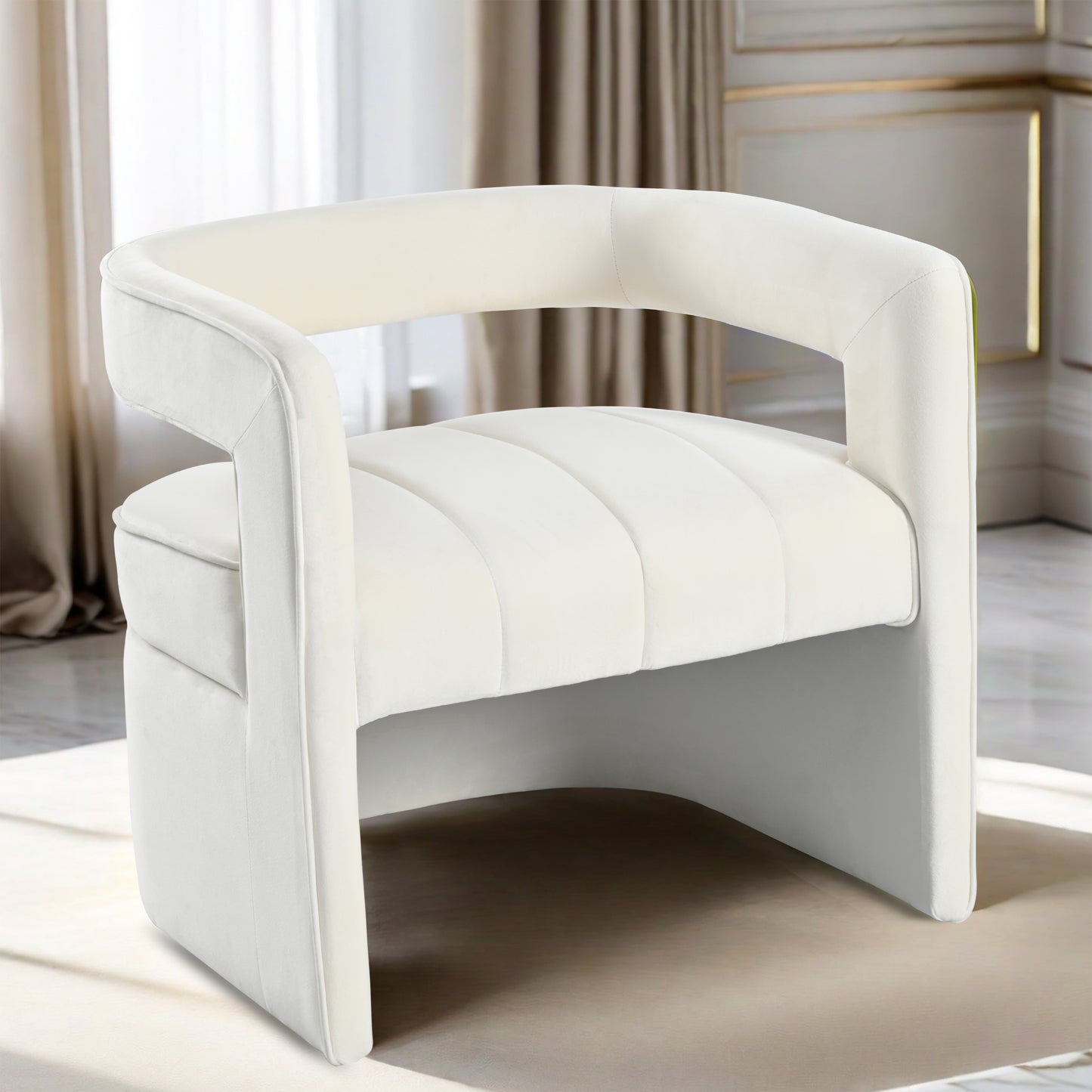 Cream velvet accent chair with curved back and tufted seat for living room elegance