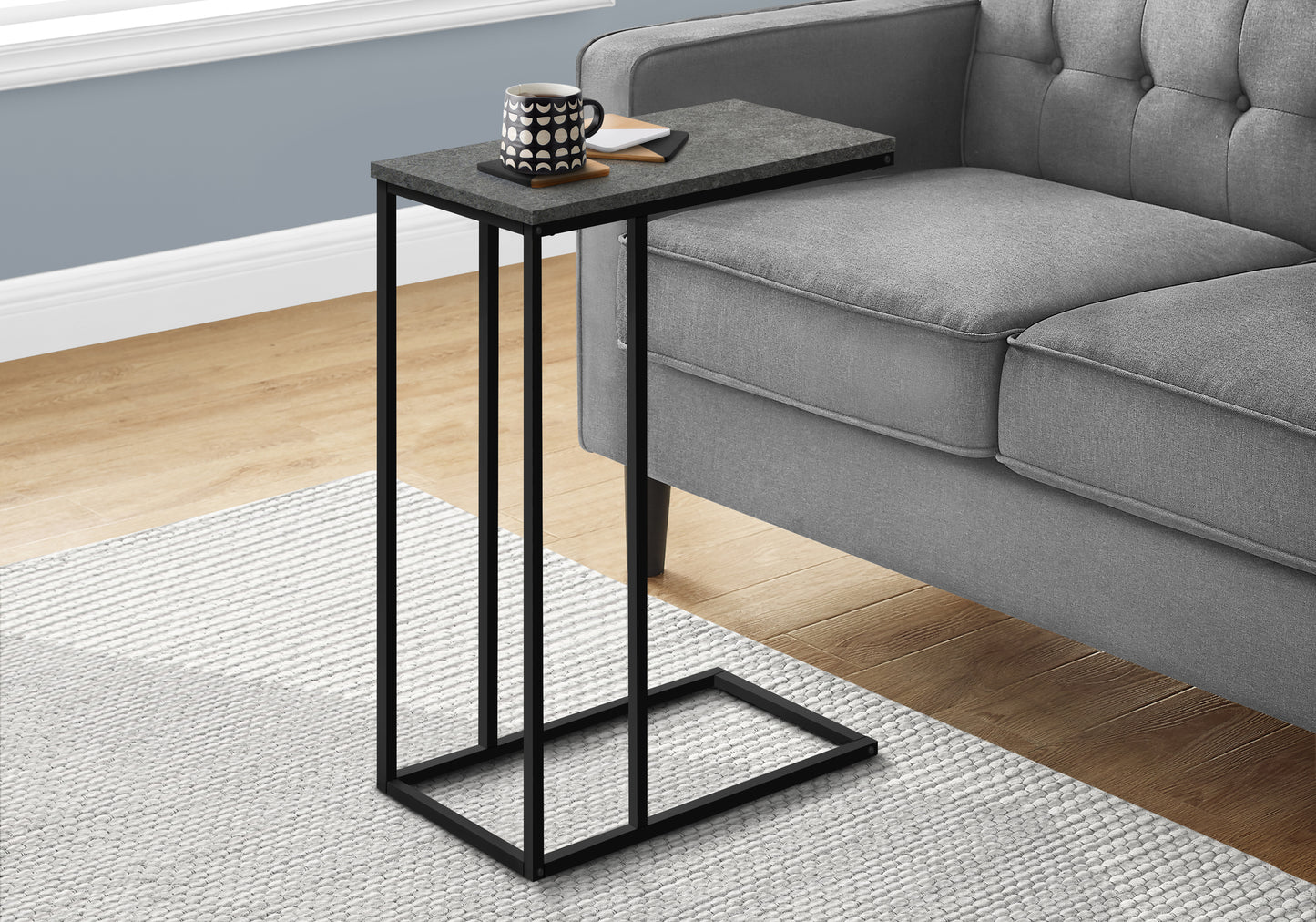 Gray faux stone Ctable with black metal frame perfect for small spaces