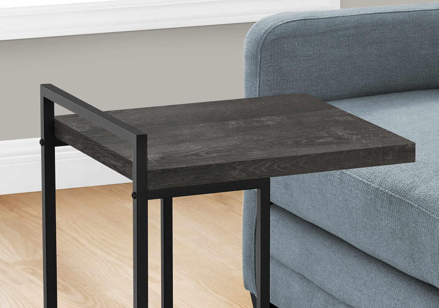Dark wood Ctable with black metal frame perfect for small spaces