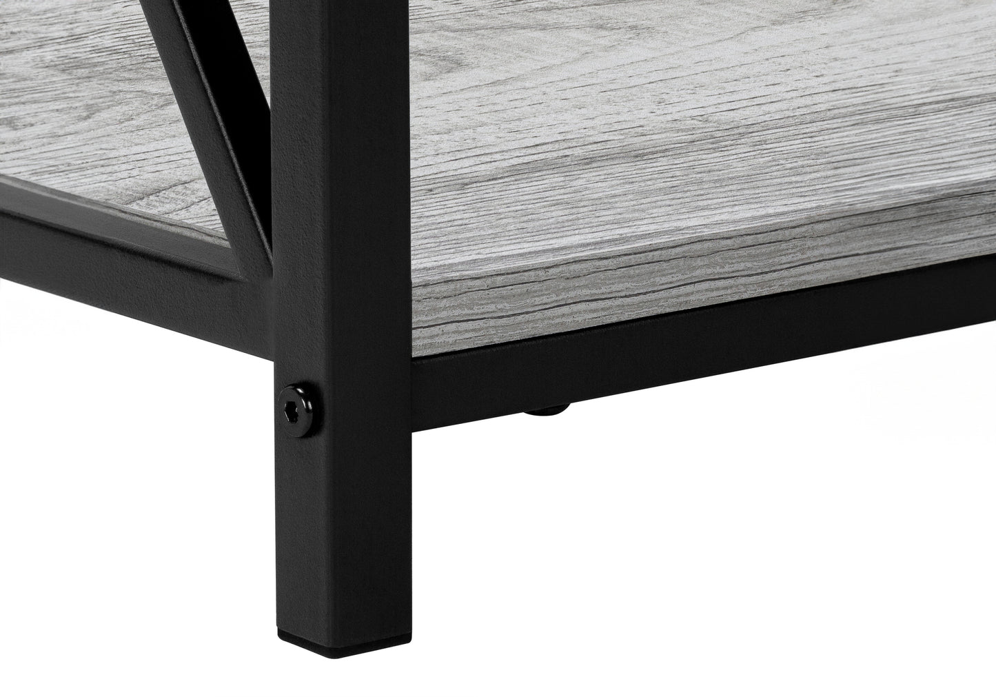 Closeup of a black metal frame corner with a gray wood grain shelf surface