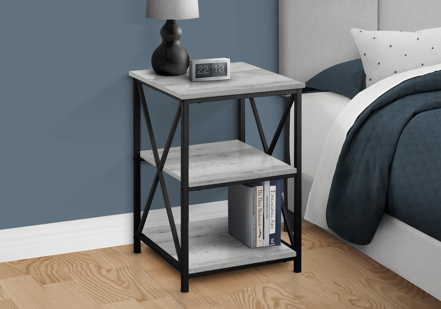 Industrial style nightstand with weathered gray wood finish and black metal frame